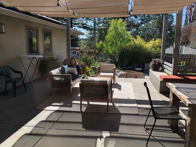 Lela working on the patio, on the new furniture.  Very happy to potentiate this.