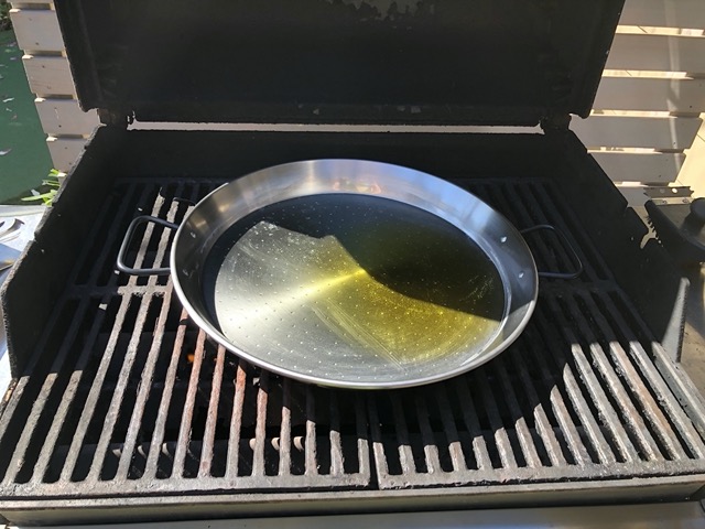 Making paella on the grill