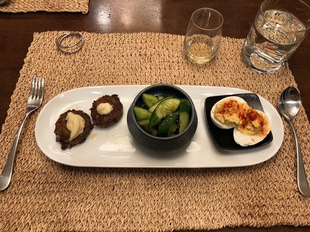 Spring dinner of mushroom patties, cucumber salad, and deviled eggs