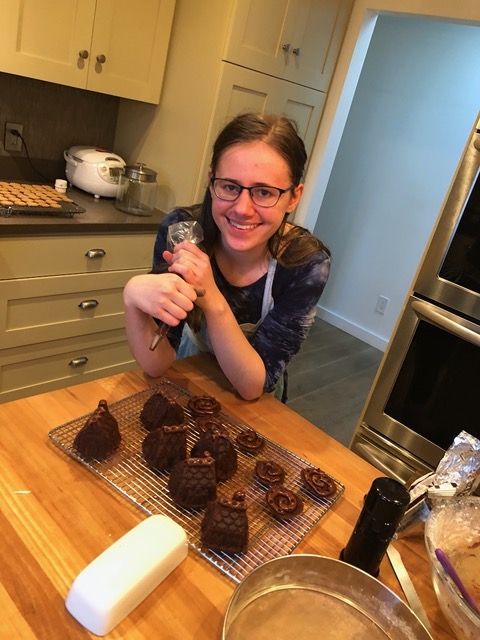 Lela decorating them