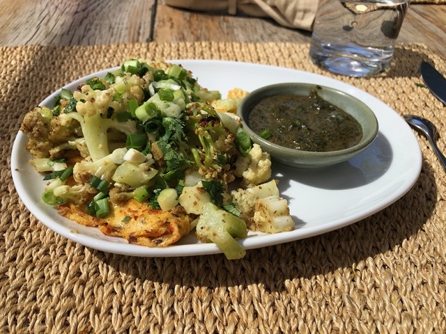 Stir fried cauliflower on an omelet