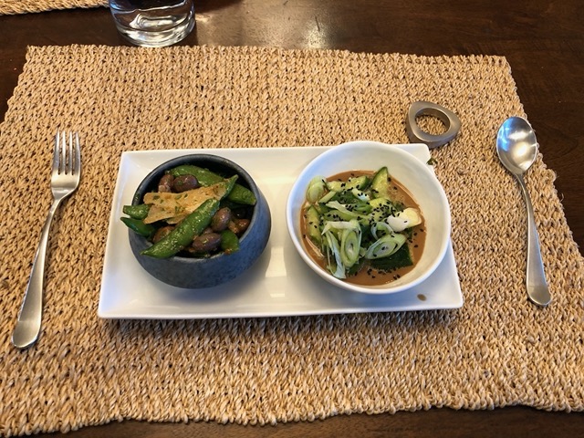 Warm bean dish, and cucumber salad on tahini sauce, delicious