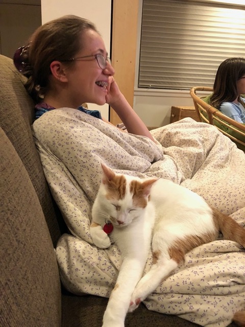Gizmo on the couch with Ellie