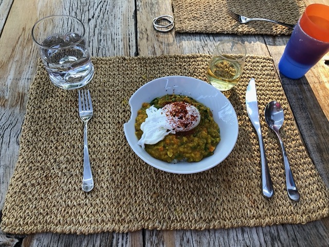 Poached egg on dal on rice