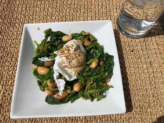 Broccolini and gigante beans with poached egg