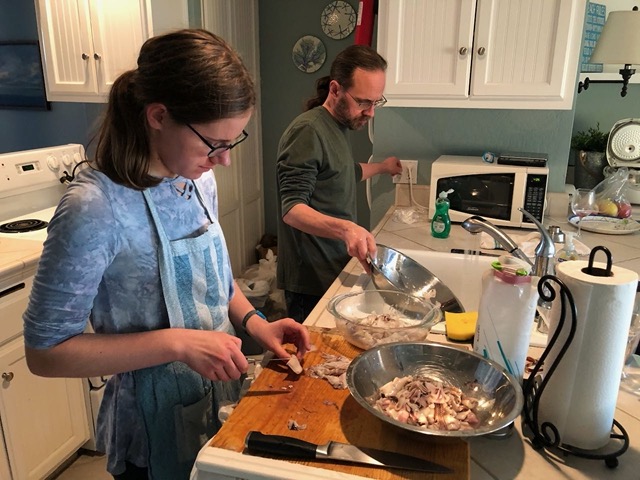 Back at the unit, Lela helped prepare the squid