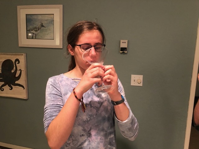 Lela trying a margarita